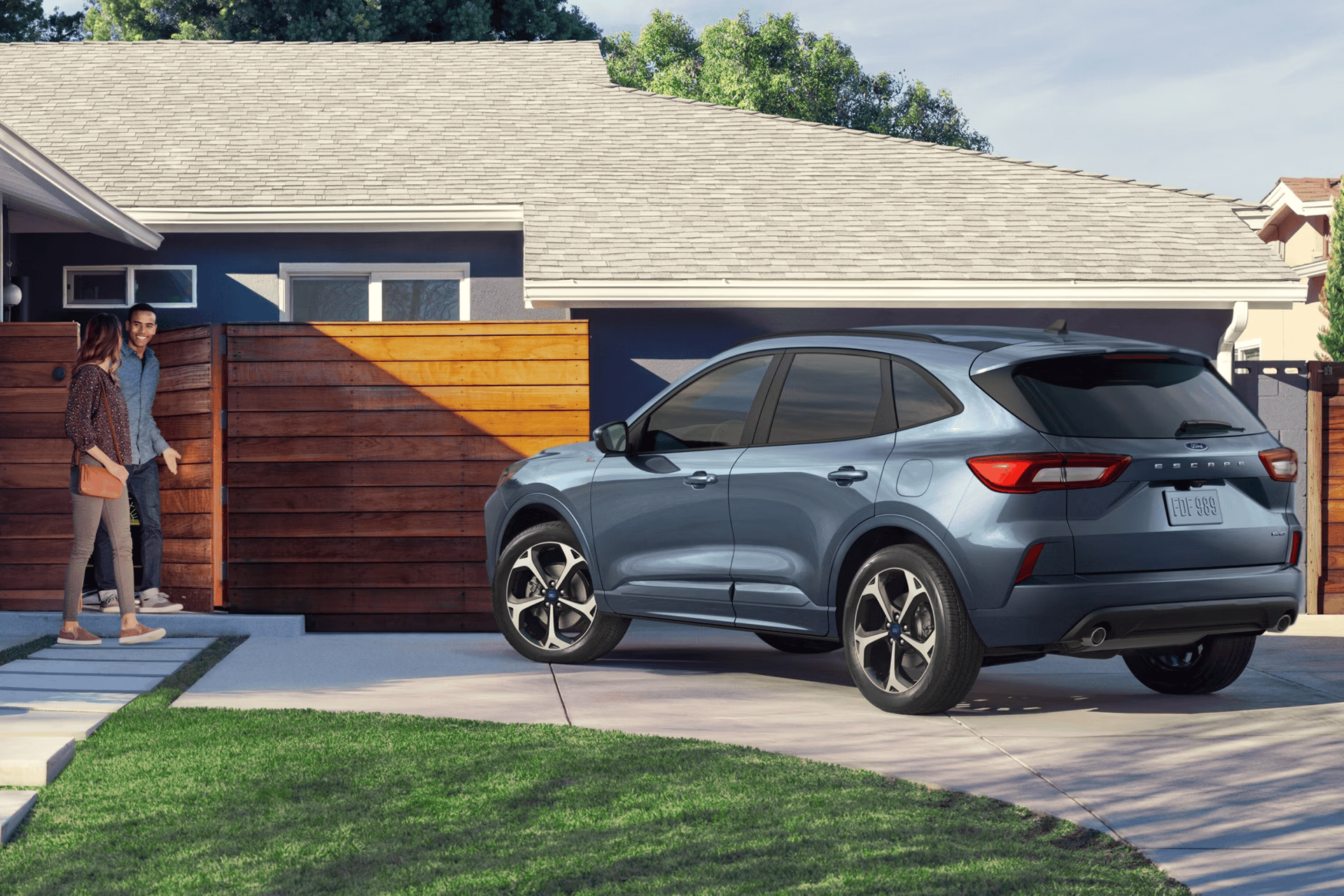 Ford SUV parked in front of a modern home in Barrhaven.